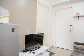 Common Space 4 Modern and Nice 2BR at Green Pramuka City Apartment By Travelio