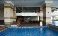 Kolam Renang 6 Spacious and Comfy 2BR Loft Apartment Maqna Residence By Travelio