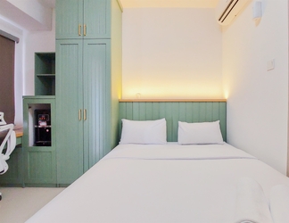 Bedroom 2 Nice and Homey Studio Apartment at Serpong Garden By Travelio