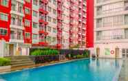 Swimming Pool 6 Cozy and Homey Studio Room Taman Melati Margonda Apartment By Travelio