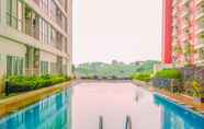 Swimming Pool 5 Cozy and Homey Studio Room Taman Melati Margonda Apartment By Travelio