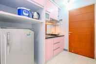 Common Space Cozy and Homey Studio Room Taman Melati Margonda Apartment By Travelio