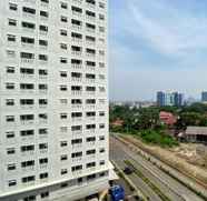 Lobby 4 Cozy Stay Studio Apartment at Green Pramuka City By Travelio