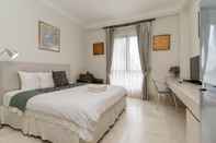 Bedroom Bangka Suite Mitra RedDoorz