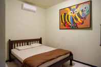 Bedroom Cakra Homestay Solo Mitra RedDoorz