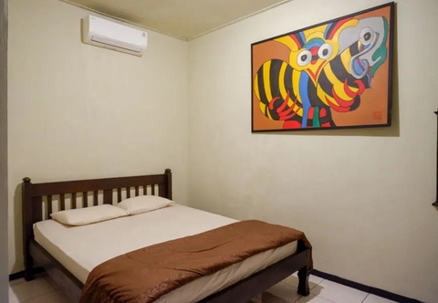 Kamar Tidur Cakra Homestay Solo Mitra RedDoorz