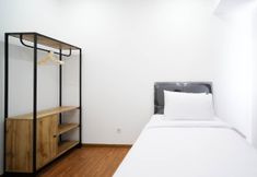 Bedroom 3 Spacey and Exclusive 3BR at Grand Sungkono Lagoon Apartment By Travelio