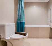 In-room Bathroom 5 Cozy Stay and Comfort 2BR Paramount Skyline Apartment By Travelio