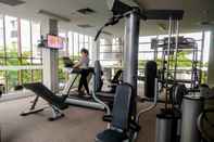 Fitness Center Homey and Comfort 1BR Apartment Scientia Residence By Travelio