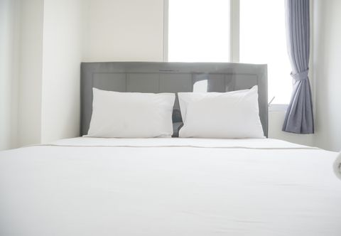 Bedroom Tidy and Nice 2BR at Bassura City Apartment near Mall By Travelio