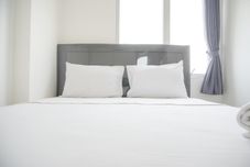 Bedroom Tidy and Nice 2BR at Bassura City Apartment near Mall By Travelio