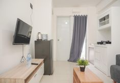 Lobby 3 Tidy and Nice 2BR at Bassura City Apartment near Mall By Travelio