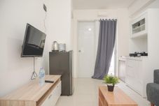 Lobby Tidy and Nice 2BR at Bassura City Apartment near Mall By Travelio