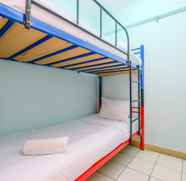 Bedroom 2 Cozy and Comfort Living 2BR at Cibubur Village Apartment By Travelio