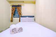 Kamar Tidur Cozy and Comfort Living 2BR at Cibubur Village Apartment By Travelio