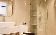 In-room Bathroom 4 Cozy and Best Deal Studio at Daan Mogot City Apartment By Travelio