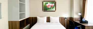 Bedroom 2 Cozy Stay Studio at Gateway Park LRT City Apartment  Bekasi By Travelio