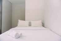 Bedroom Homey and Comfort 2BR at Transpark Bintaro Apartment By Travelio