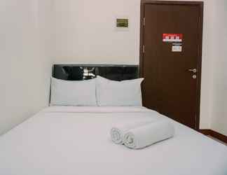 Bilik Tidur 2 Cozy Stay Studio Apartment at Loftvilles City By Travelio