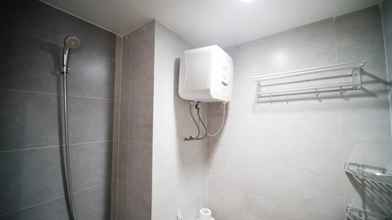 In-room Bathroom 4 Simple and Good Deals Studio at Taman Melati Surabaya Apartment By Travelio