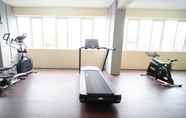 Fitness Center 6 Tidy and Cozy Living 2BR at Puncak Dharmahusada Apartment By Travelio