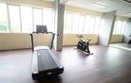 Fitness Center 5 Tidy and Cozy Living 2BR at Puncak Dharmahusada Apartment By Travelio