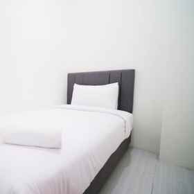 Bedroom 2 Tidy and Cozy Living 2BR at Puncak Dharmahusada Apartment By Travelio, Mulyorejo Hotels