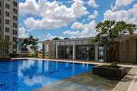 Swimming Pool Homey and Best Modern 1BR at M-Town Signature Apartment By Travelio