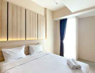 Bedroom 2 Homey and Spacious 1BR Vasanta Innopark Apartment By Travelio