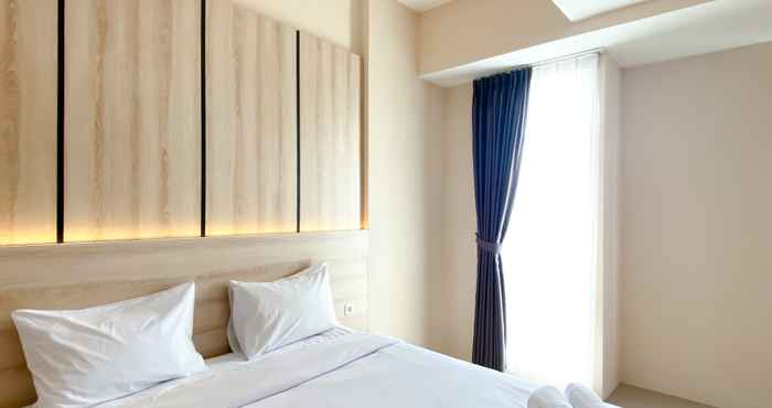 Bedroom Homey and Spacious 1BR Vasanta Innopark Apartment By Travelio