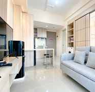 Lobby 2 Homey and Spacious 1BR Vasanta Innopark Apartment By Travelio