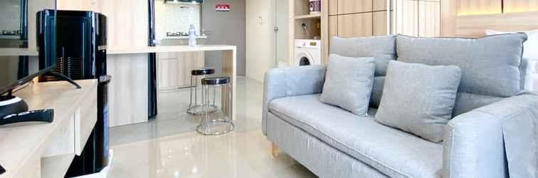 Lobby Homey and Spacious 1BR Vasanta Innopark Apartment By Travelio