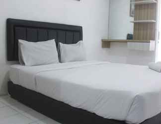 Kamar Tidur 2 Best Deal and Homey Studio Apartment at Emerald Towers By Travelio