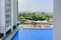 Swimming Pool Minimalist and Cozy Studio Room Ciputra International Apartment By Travelio