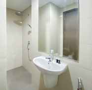 In-room Bathroom 2 Minimalist and Cozy Studio Room Ciputra International Apartment By Travelio