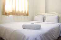 Kamar Tidur Simple Chic 2BR at Suites @Metro Apartment by Travelio