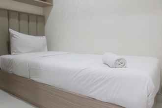 Kamar Tidur 4 Homey and Simple 2BR Apartment at Grand Asia Afrika By Travelio