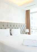 BEDROOM Elegant and Warm 2BR at The Kensington Royal Suites Apartment By Travelio