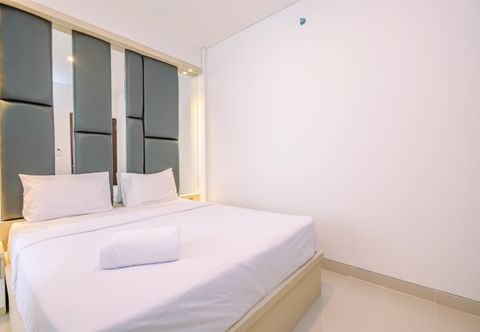 Kamar Tidur Classic and Simply Modern 2BR at Transpark Cibubur Apartment By Travelio