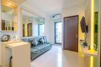 Lobi Classic and Simply Modern 2BR at Transpark Cibubur Apartment By Travelio