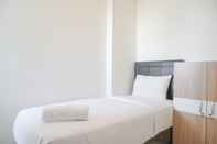 Bedroom Homey and Great Choice 2BR Signature Park Grande Apartment By Travelio