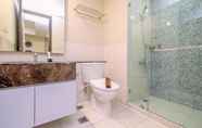 In-room Bathroom 3 Minimalist and Homey 2BR Apartment at Nine Residence By Travelio