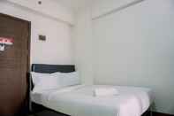 Bilik Tidur Simply Look Studio Apartment at Loftvilles City By Travelio