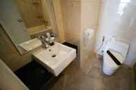 In-room Bathroom Spacious and Strategic 2BR at Apartment Trillium Residence By Travelio