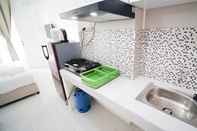 Common Space Tidy and Compact Studio at Puncak Dharmahusada Apartment By Travelio