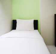 Kamar Tidur 2 Homey and Simple 2BR at Dian Regency Apartment By Travelio