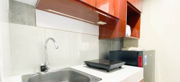 Common Space 4 Good Choice and Homey Studio at Amartha View Apartment By Travelio
