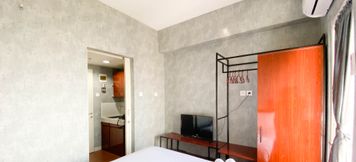 Bedroom 2 Good Choice and Homey Studio at Amartha View Apartment By Travelio