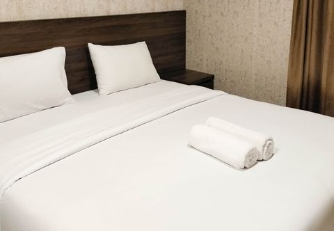 Bedroom Simply and Comfort 1BR at Patraland Amarta Apartment By Travelio
