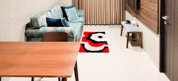 Lobby 2 Simply and Comfort 1BR at Patraland Amarta Apartment By Travelio